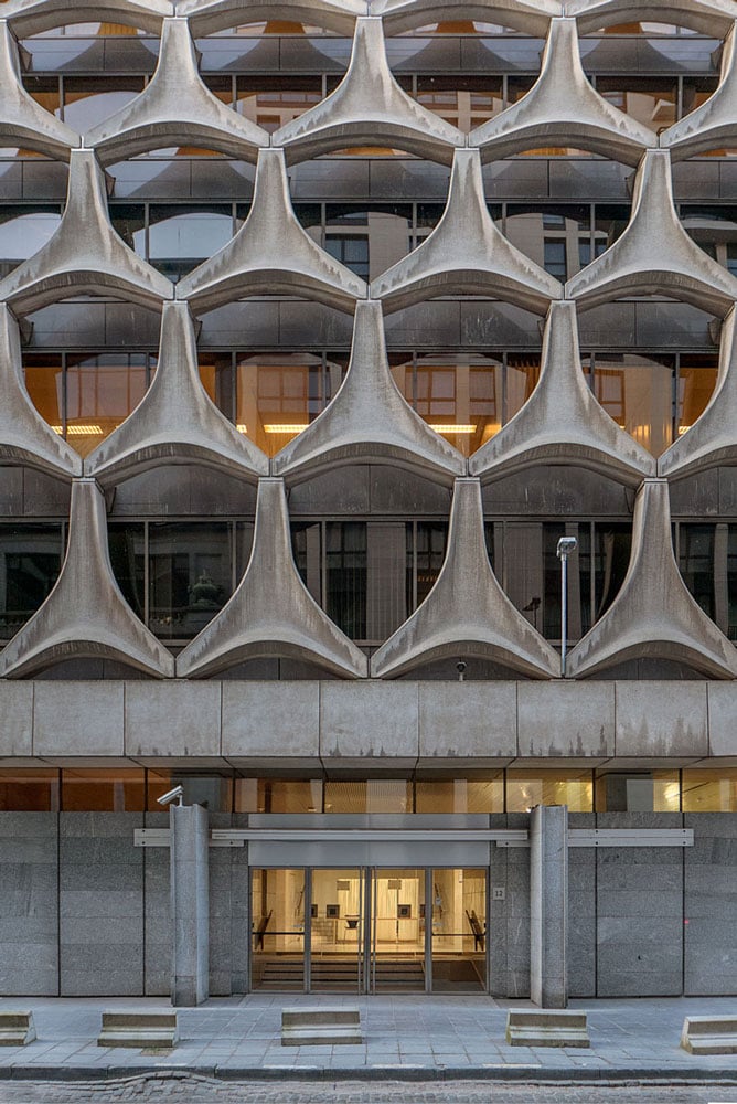 Marcel-Breuer-Bnp-Paribas-Architecture Bnp paribas building, rue neuve, paris, designed by marcel breuer. Completed in 1972, this brutalist structure features raw concrete and precast panels, showcasing breuer's geometric design and functional aesthetics. © marcel bretzel